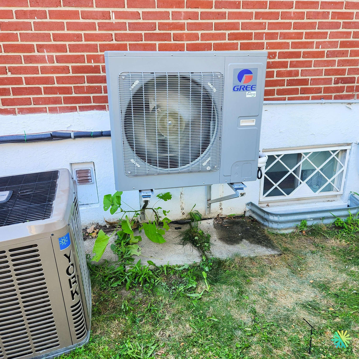 Installation d’une thermopompe centrale GREE au Plateau-Mont-Royal à Montréal : remplacement stratégique et intégration soignée dans un environnement résidentiel dense
