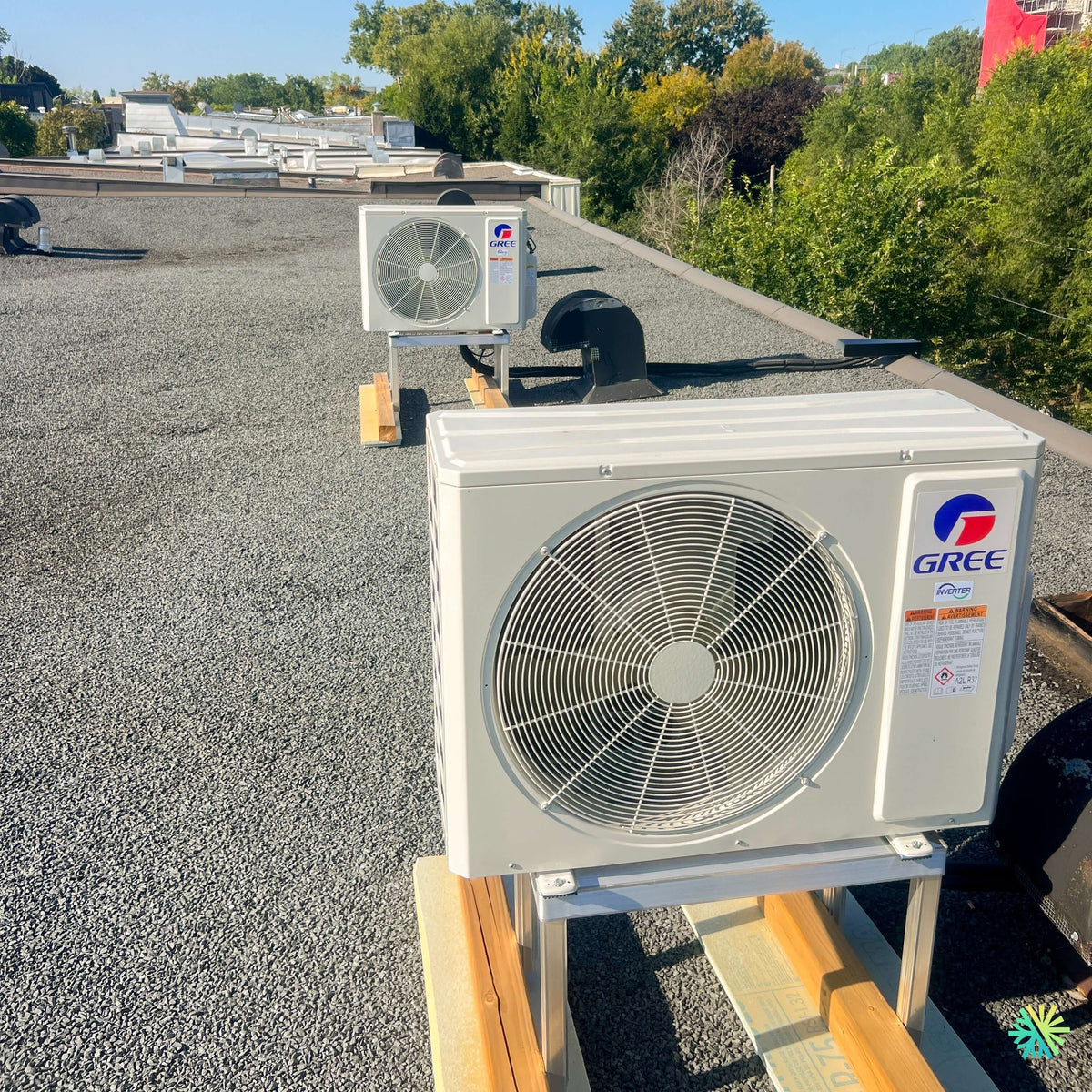 Installation d'une thermopompe murale 2 têtes GREE Freematch R32 sur toit de plex à Saint-Hyacinthe
