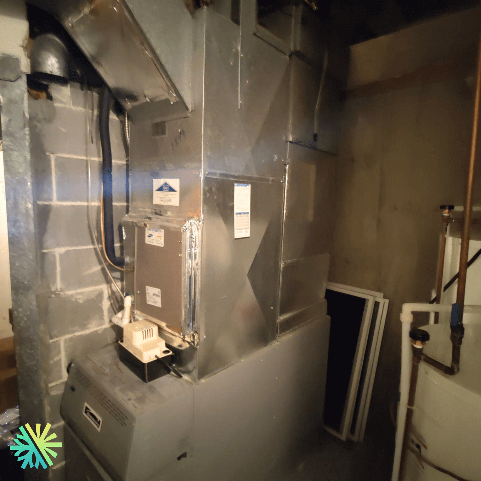 Triomphe de réparation d'une thermopompe centrale à Westmount