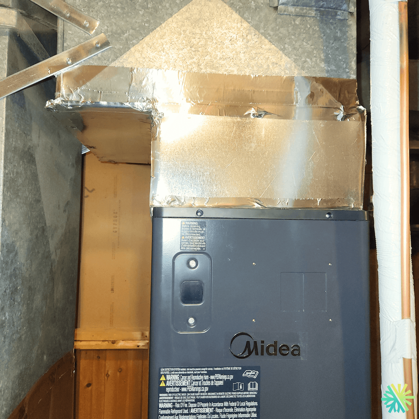 Installation d’une thermopompe centrale Midea à Brossard (Rive Sud)