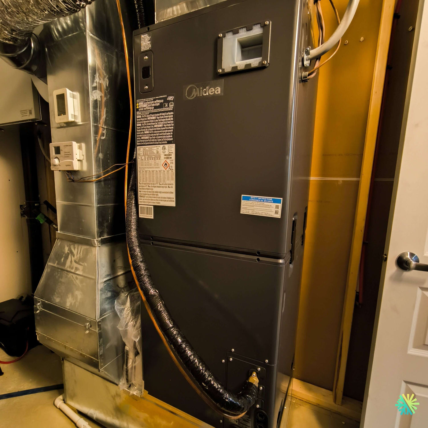 Installation d’une Fournaise Électrique MIDEA EVOX G3 3 Tonnes avec Système Central Air Handler à Anjou