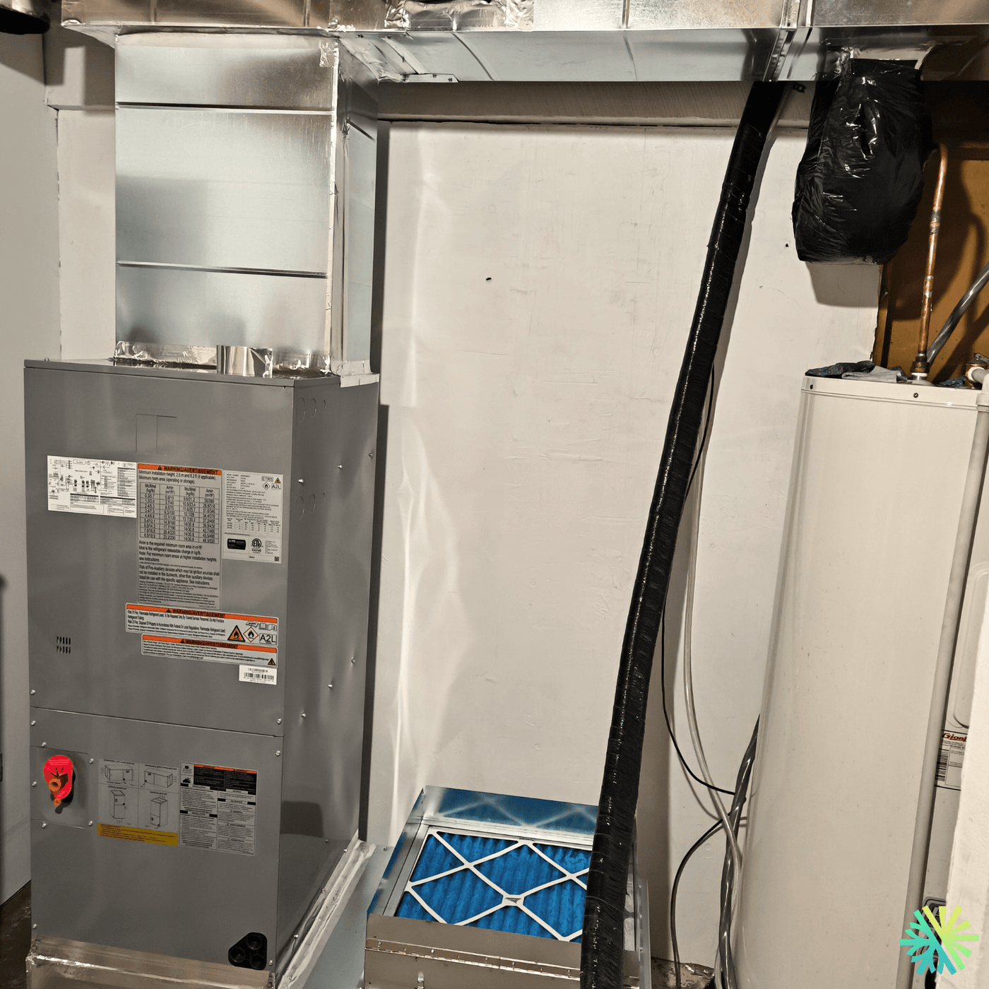 Installation d’une thermopompe centrale Midea EVOX G3 à Sainte-Dorothée (Laval)