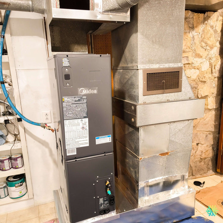 Installation d’une fournaise électrique MIDEA EVOX G3 2 tonnes avec système central Air Handler dans le Plateau-Mont-Royal