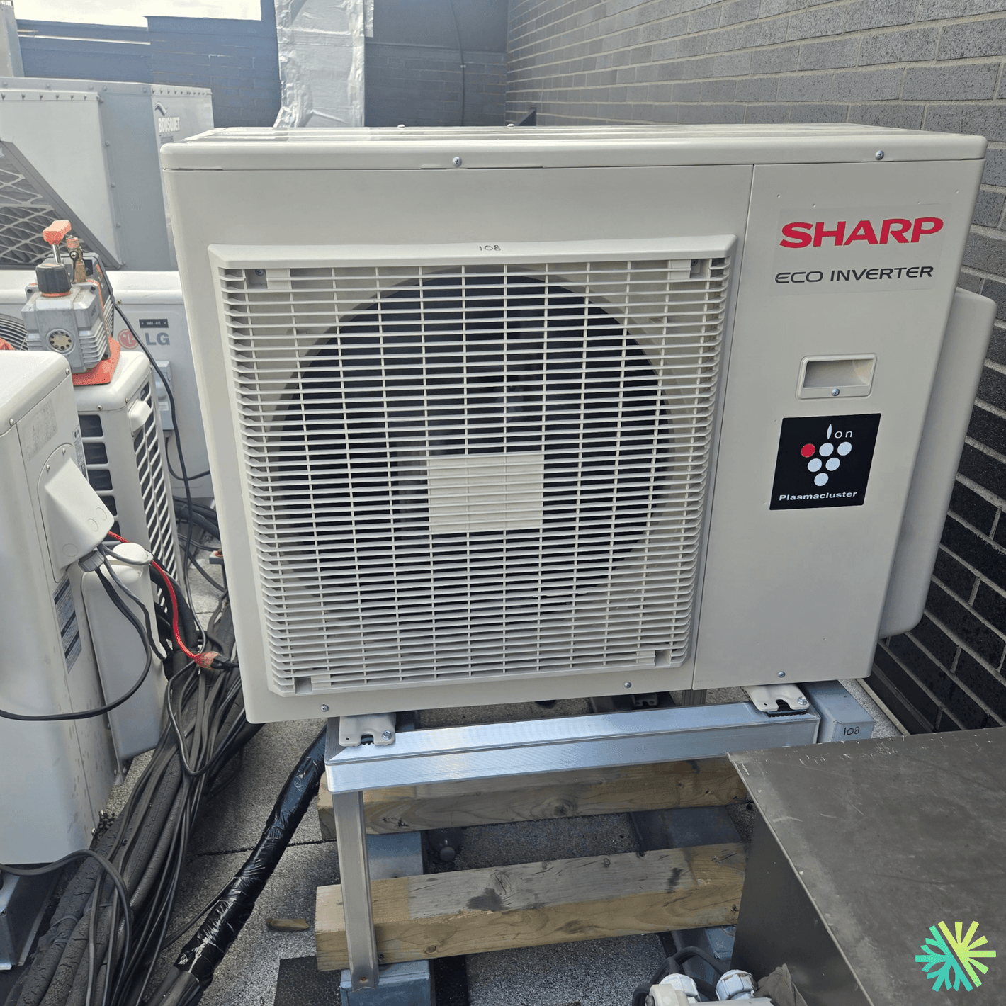 Sharp eco inverter air conditioning unit installation on rooftop