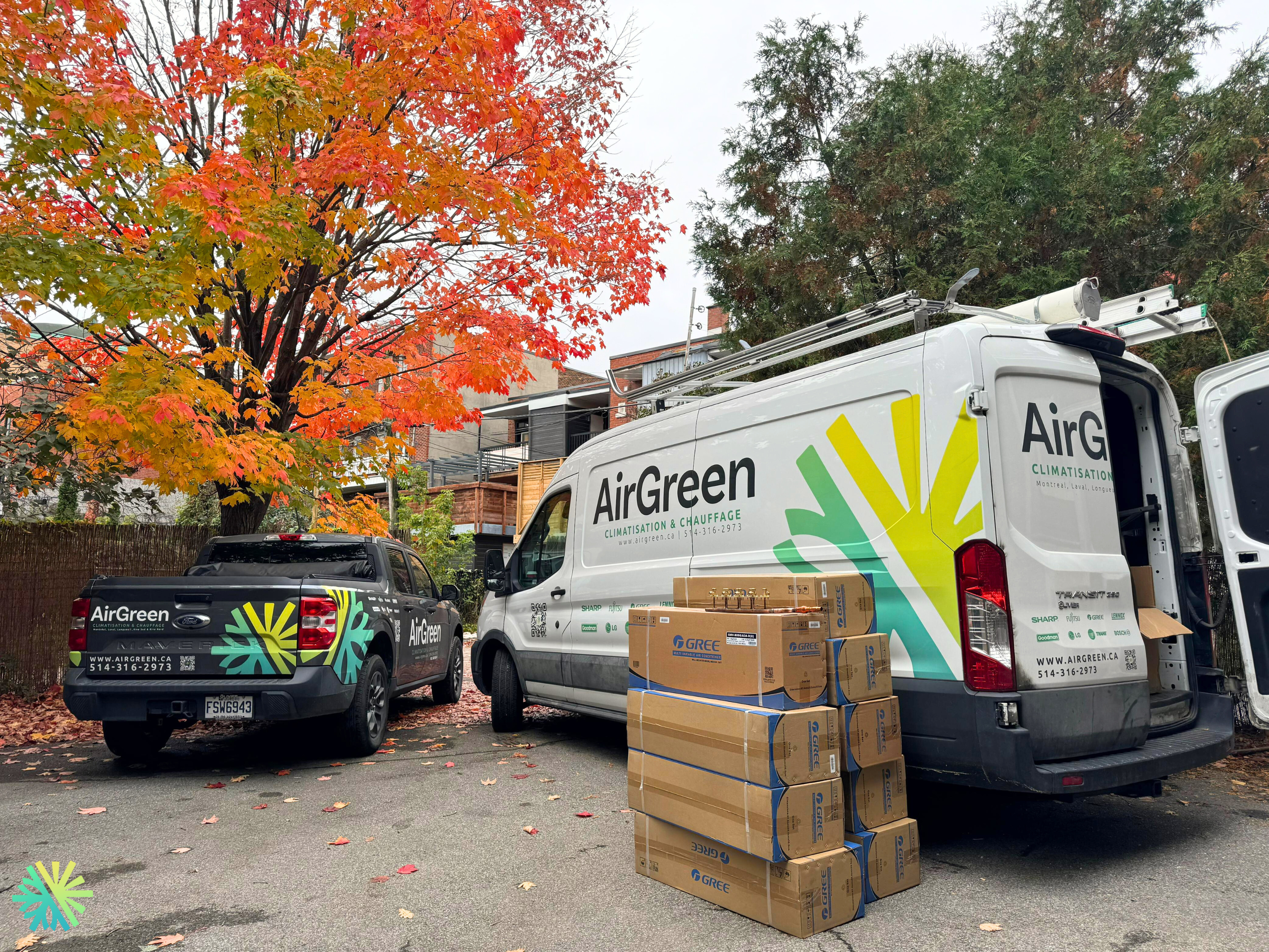AirGreen vehicles and equipment in a vibrant autumn setting, ready for HVAC installation and climate services.