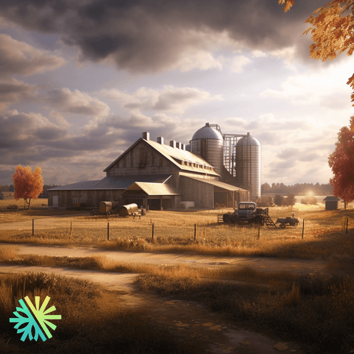 Farm with a barn and silos under an autumn sky