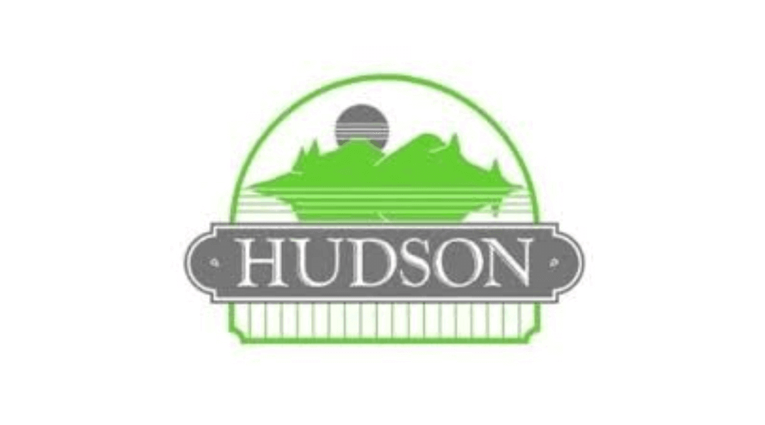 Logo featuring green mountains with text 'Hudson' in grey under a stylized sun.