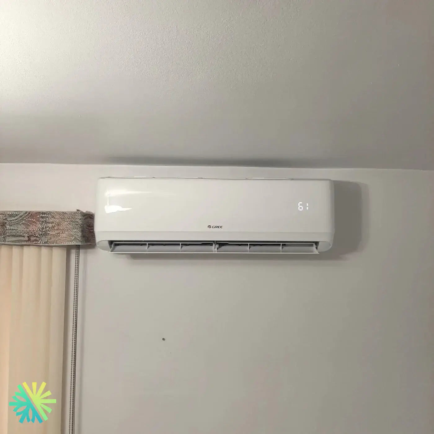 Modern white wall-mounted air conditioner unit in a room, providing efficient cooling in a seamless design.