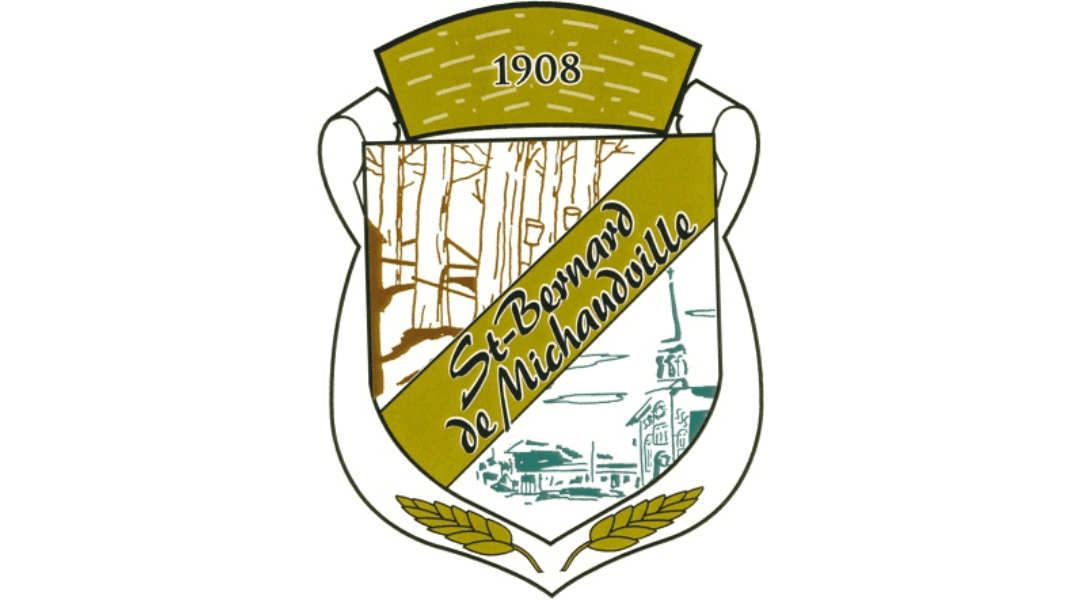 St. Bernard de Michaudville emblem featuring the year 1908, trees, and buildings, symbolizing the town's heritage.